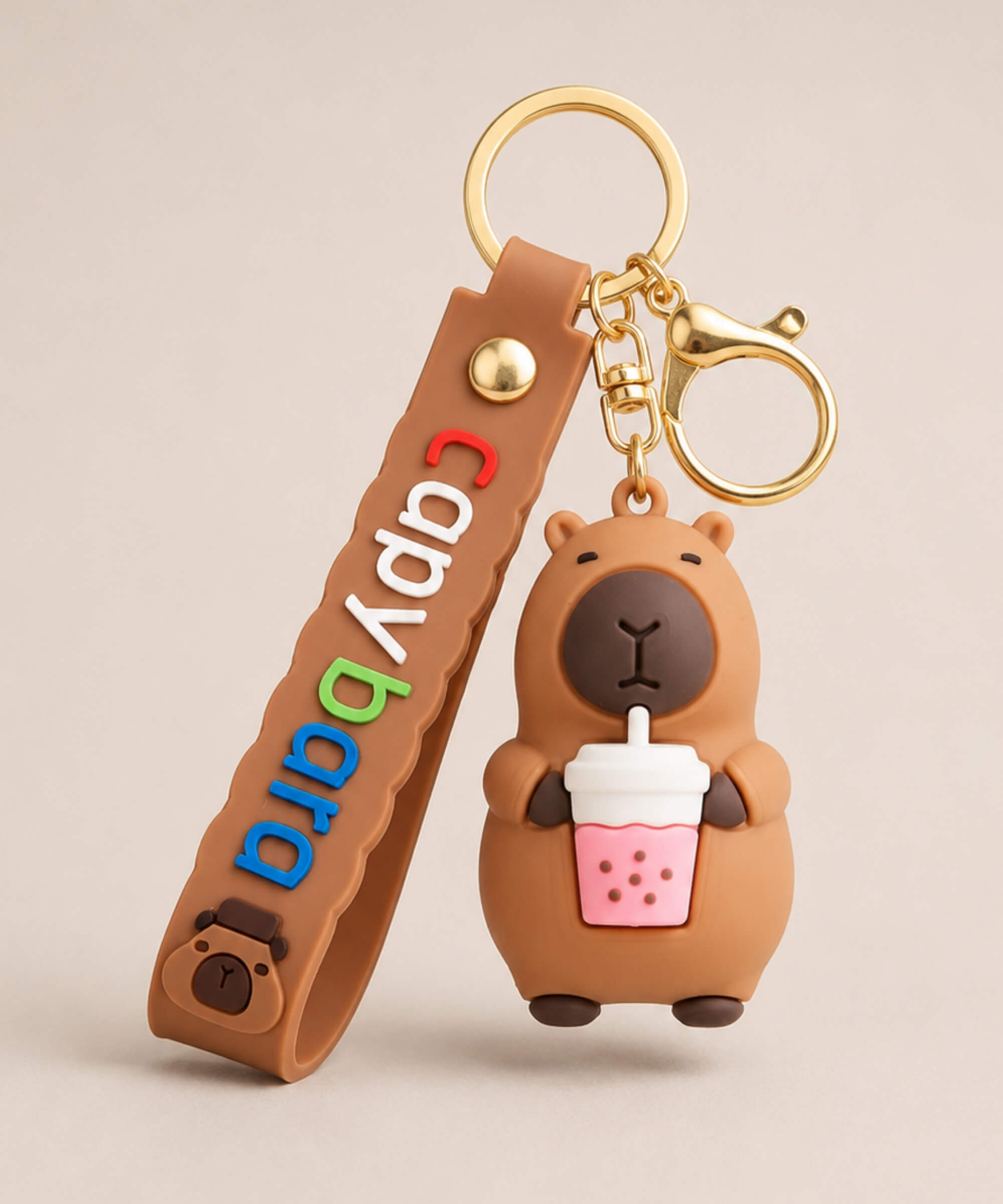 Capybara milk tea classic keychain with brown strap and gold hardware